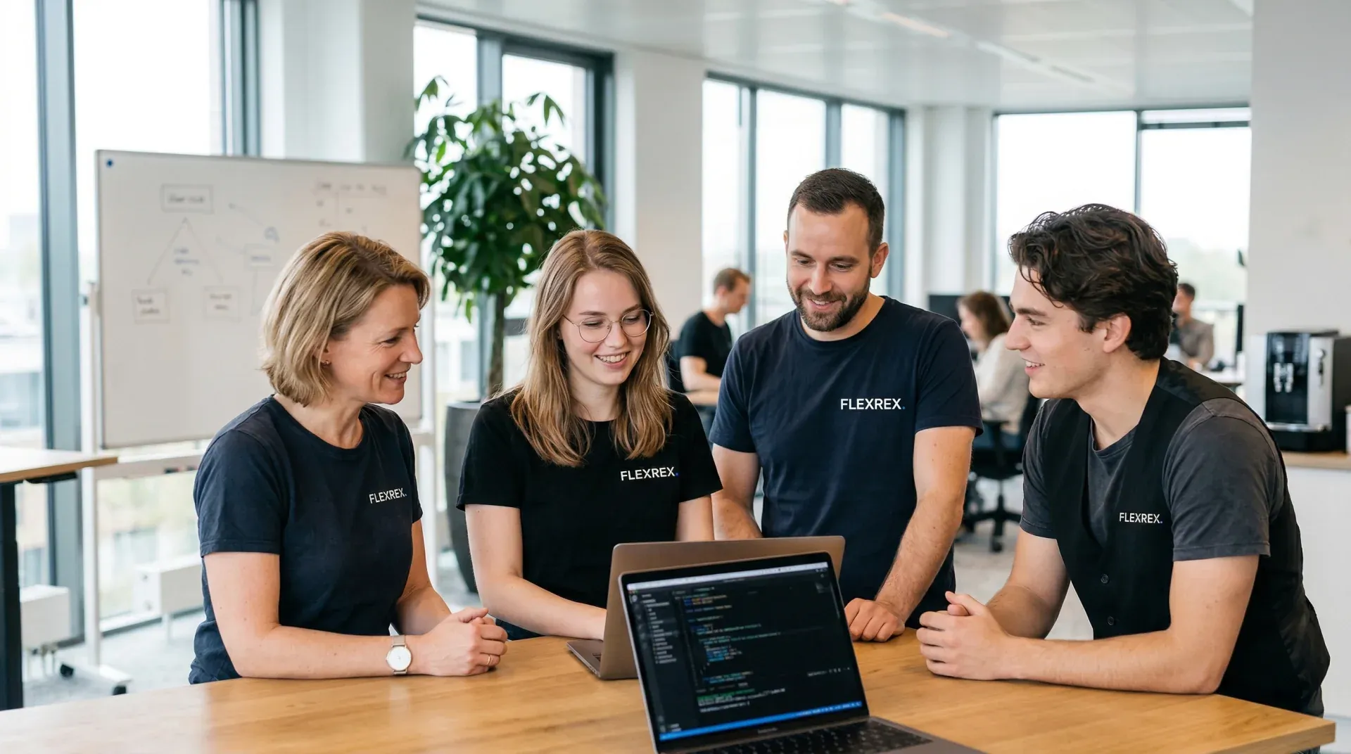 Flexrex team reviewing code together in the Amsterdam office